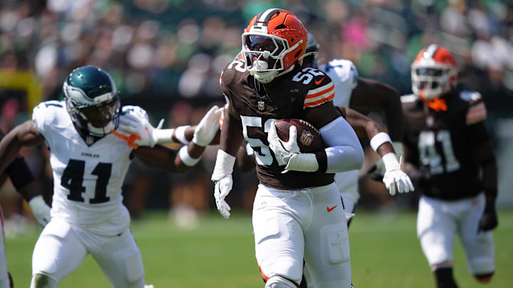 Aug 16, 2025; Philadelphia, Pennsylvania, USA; Cleveland Browns defensive lineman K.J. Henry (52) returns an interception for a touchdown against the Philadelphia Eagles in the second half at Lincoln Financial Field.