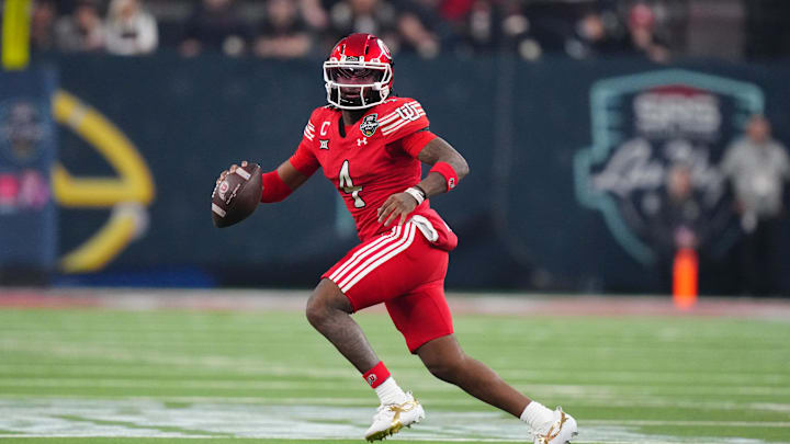 Utah Utes quarterback Devon Dampier (4) broke Alex Smith's program record for total yards of offense in a bowl game during a 44-22 win over the Nebraska Cornhuskers in the Las Vegas Bowl.