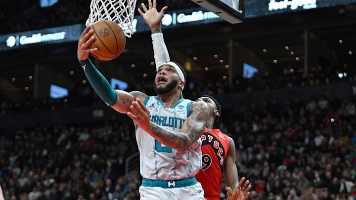 Mar 3, 2024; Toronto, Ontario, CAN;  Charlotte Hornets forward Miles Bridges (0) shoots the ball against the Toronto Raptors in the second half at Scotiabank Arena. Mandatory Credit: Dan Hamilton-Imagn Images