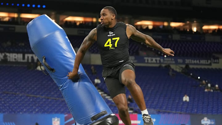 Boston College defensive lineman Donovan Ezeiruaku participates in drills during the 2025 NFL Combine.