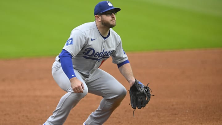 May 27, 2025; Cleveland, Ohio, USA; Los Angeles Dodgers third baseman Max Muncy (13) stands on the field in the third inning against the Cleveland Guardians at Progressive Field. Mandatory Credit: David Richard-Imagn Images