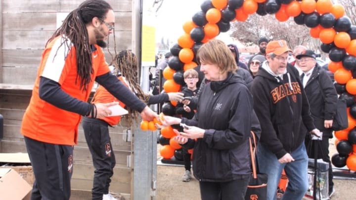 SF Giants fans entering FanFest at Napa Yard entrance.