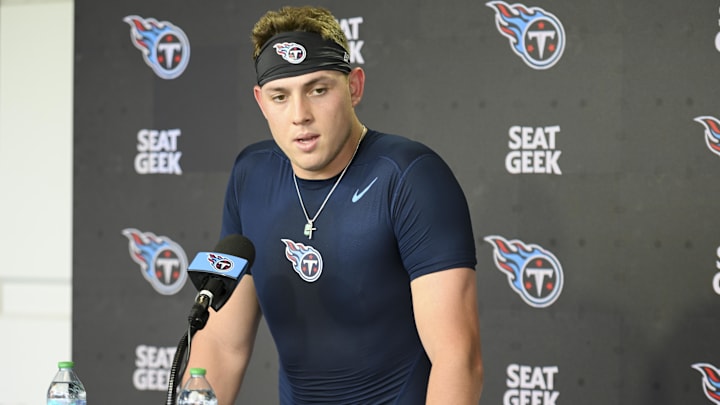 May 10, 2025; Nashville, TN, USA;  Tennessee Titans tight end Gunnar Helm (84) talks with reporters after his first day of rookie mini camp at Saint Thomas Sports Park. Mandatory Credit: Steve Roberts-Imagn Images