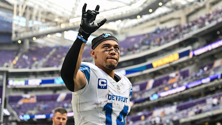 Oct 20, 2024; Minneapolis, Minnesota, USA; Detroit Lions wide receiver Amon-Ra St. Brown (14) walks off the field after the game against the Minnesota Vikings at U.S. Bank Stadium. Mandatory Credit: Jeffrey Becker-Imagn Images
