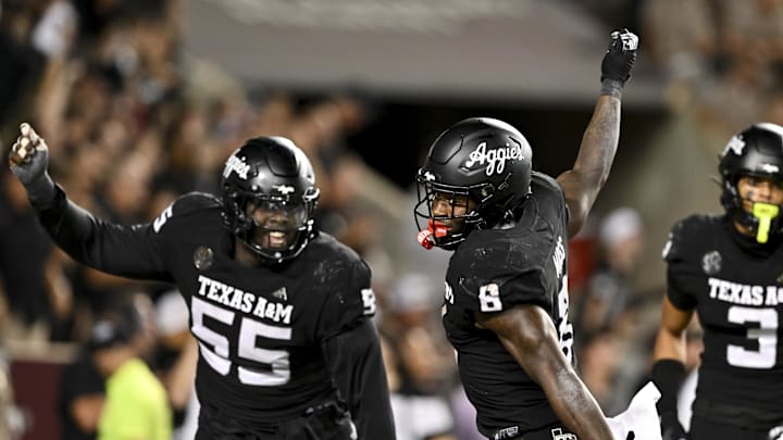 Oct 26, 2024; College Station, Texas, USA; Texas A&M Aggies running back Le'Veon Moss (8) reacts after scoring a touchdown against the LSU Tigers in the fourth quarter at Kyle Field. Mandatory Credit: Maria Lysaker-Imagn Images. Oct 26, 2024; College Station, Texas, USA; Texas A&M Aggies running back Le'Veon Moss (8) reacts after scoring a touchdown against the LSU Tigers in the fourth quarter at Kyle Field. Mandatory Credit: Maria Lysaker-Imagn Images.