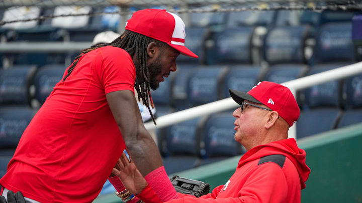May 26, 2025; Kansas City, Missouri, USA; Cincinnati Reds designated hitter Elly De La Cruz (44) talks with manager Terry Francona (77) at the dugout against the Kansas City Royals prior to a game at Kauffman Stadium. Mandatory Credit: Denny Medley-Imagn Images