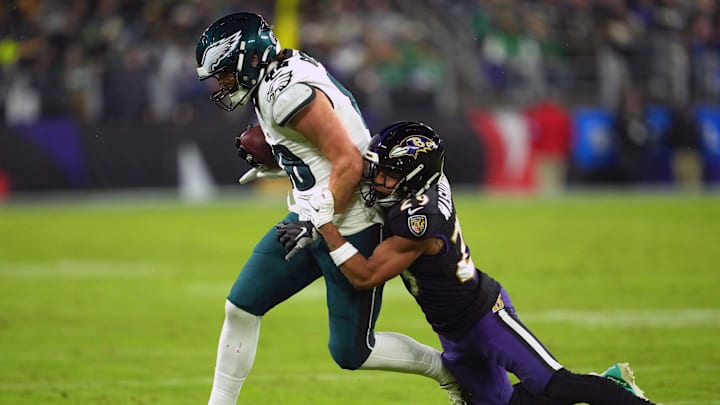 Dec 1, 2024; Baltimore, Maryland, USA; Philadelphia Eagles tight end Dallas Goedert (88) gains yardage after a third quarter catch defended by Baltimore Ravens safety Ar’Darius Washington (29) at M&T Bank Stadium. Mandatory Credit: Mitch Stringer-Imagn Images