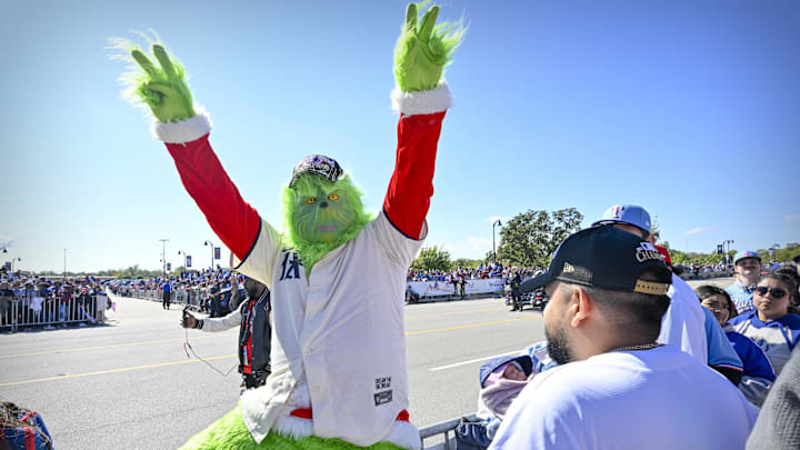 Nov 3, 2023; Arlington, TX, USA; A view of a Texas Rangers fan in a Grinch costume during the World