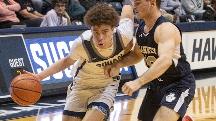 Squan Darius Adams drive to basket in second half action. Manasquan Boys basketball defeats Ranney  61-46 in Shore Conference Final in West Long Branch on February 19, 2023

Bbbsqry230219q