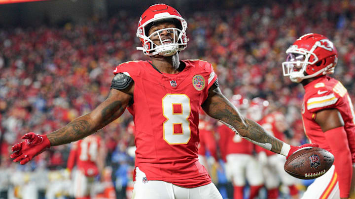 Kansas City Chiefs wide receiver DeAndre Hopkins (8) celebrates after scoring against the Los Angeles Chargers during the first half at GEHA Field at Arrowhead Stadium.
