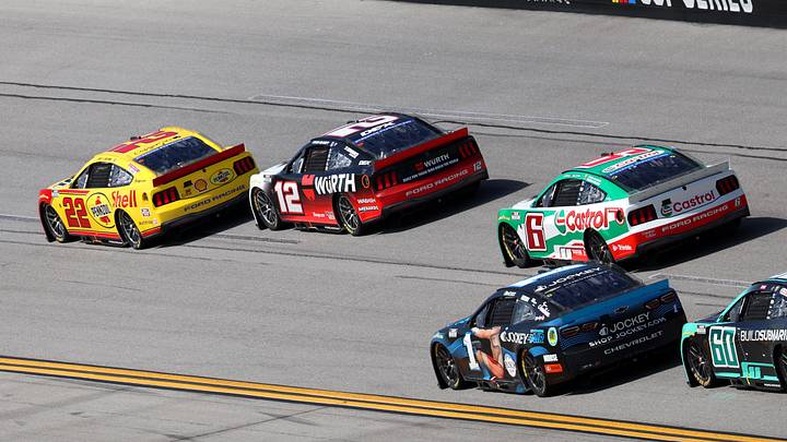 Apr 26, 2026; Talladega, Alabama, USA; NASCAR Cup Series driver Joey Logano (22) leads at turn three against drivers Ryan Blaney (12), Brad Keselowski (6), and Ross Chastain (1) during stage two of the Jack Links 500 NASCAR Cup Series race at Talladega Superspeedway. David Leong-Imagn Images Apr 26, 2026; Talladega, Alabama, USA; NASCAR Cup Series driver Joey Logano (22) leads at turn three against drivers Ryan Blaney (12), Brad Keselowski (6), and Ross Chastain (1) during stage two of the Jack Links 500 NASCAR Cup Series race at Talladega Superspeedway. David Leong-Imagn Images