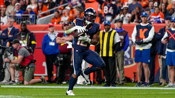 Denver Broncos running back RJ Harvey (12) catches a wide open pass for a touchdown in the fourth quarter of the NFL Week 4 Monday Night Football game between the Denver Broncos and the Cincinnati Bengals at Empower Field at Mile High in Denver on Monday, Sept. 29, 2025. The Bengals fell to 2-2 with a 28-3 loss to the Broncos.