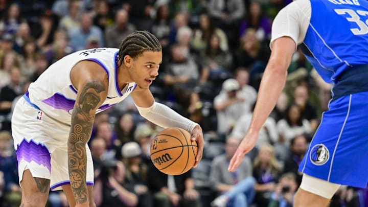 Oct 13, 2025; Salt Lake City, Utah, USA; Utah Jazz guard Keyonte George (3) plans his next move against Dallas Mavericks forward Cooper Flagg (32) during the second half at Delta Center. Mandatory Credit: Peter Creveling-Imagn Images