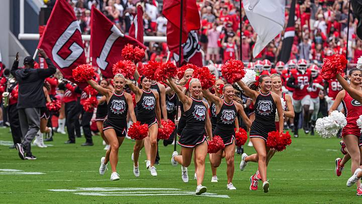 Georgia Bulldogs cheerleaders on the field before the game against the Vanderbilt Commodores