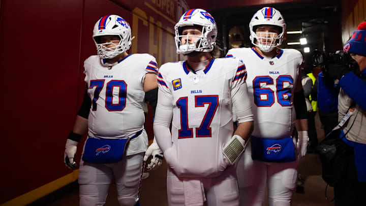 Buffalo Bills offensive tackle Alec Anderson (70), quarterback Josh Allen (17), and guard Connor McGovern (66) against the Kansas City Chiefs.