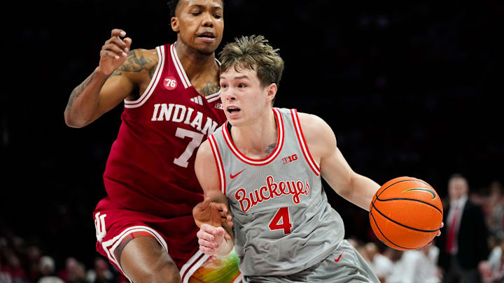 Ohio State Buckeyes guard Gabe Cupps (4) dribbles the ball against Indiana Hoosiers forward Nick Dorn (7) in the first half of the NCAA game at Value City Arena on Saturday, March 7, 2026 in Columbus, Ohio.