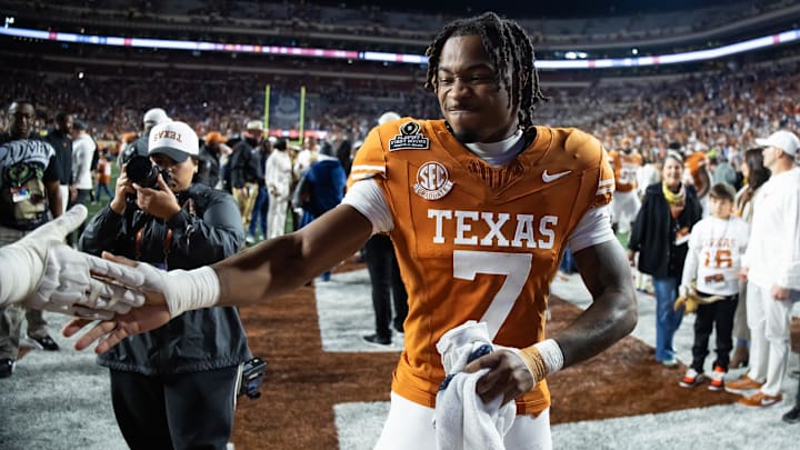 Dec 21, 2024; Austin, Texas, USA; Texas Longhorns defensive back Jahdae Barron (7) against the Clemson Tigers during the CFP National playoff first round at Darrell K Royal-Texas Memorial Stadium. Mandatory Credit: Mark J. Rebilas-Imagn Images