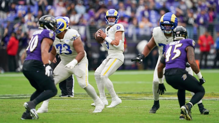 Oct 12, 2025; Baltimore, Maryland, USA; Los Angeles Rams quarterback Matthew Stafford (9) looks to pass the ball against the Baltimore Ravens during the third quarter of the game at M&T Bank Stadium. Mandatory Credit: Mitch Stringer-Imagn Images Oct 12, 2025; Baltimore, Maryland, USA; Los Angeles Rams quarterback Matthew Stafford (9) looks to pass the ball against the Baltimore Ravens during the third quarter of the game at M&T Bank Stadium. Mandatory Credit: Mitch Stringer-Imagn Images