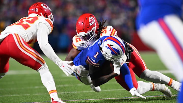 Nov 17, 2024; Orchard Park, New York, USA; Buffalo Bills wide receiver Curtis Samuel (1) is tackled by Kansas City Chiefs linebacker Nick Bolton (32) and cornerback Trent McDuffie (22) in the fourth quarter at Highmark Stadium