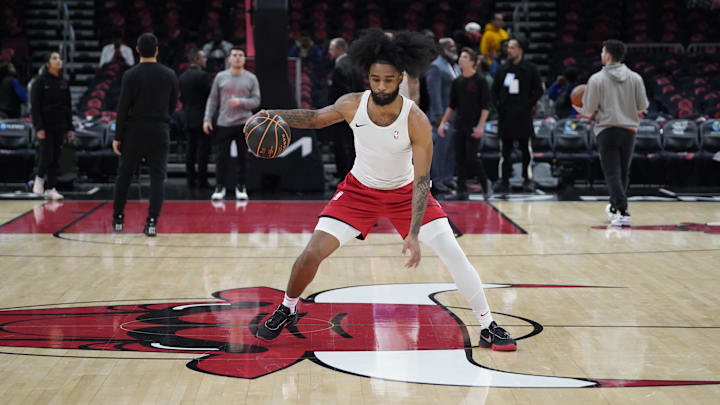 Jan 4, 2025; Chicago, Illinois, USA; Chicago Bulls guard Coby White (0) warms up before the game against the New York Knicks at United Center. Mandatory Credit: David Banks-Imagn Images