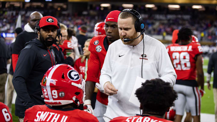 Jan 9, 2023; Inglewood, CA, USA; Georgia Bulldogs co-defensive coordinator and linebackers coach Glenn Schumann against the TCU Horned Frogs during the CFP national championship game at SoFi Stadium. Mandatory Credit: Mark J. Rebilas-Imagn Images Jan 9, 2023; Inglewood, CA, USA; Georgia Bulldogs co-defensive coordinator and linebackers coach Glenn Schumann against the TCU Horned Frogs during the CFP national championship game at SoFi Stadium. Mandatory Credit: Mark J. Rebilas-Imagn Images