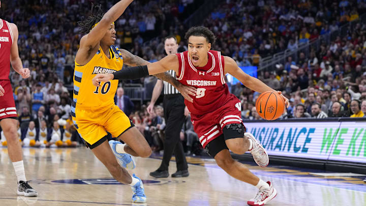 John Tonje drives to the basket for Wisconsin Saturday vs. Marquette. John Tonje drives to the basket for Wisconsin Saturday vs. Marquette.