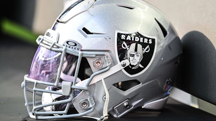 Aug 10, 2024; Minneapolis, Minnesota, USA; A Las Vegas Raiders helmet sits on the team bench before the game against the Minnesota Vikings at U.S. Bank Stadium. Mandatory Credit: Jeffrey Becker-Imagn Images