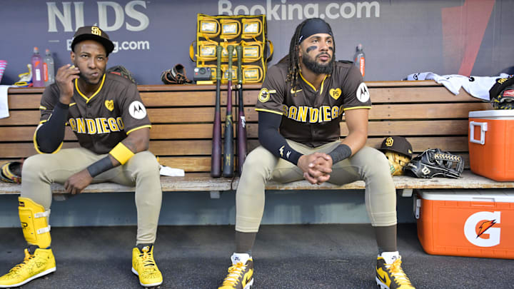 Oct 6, 2024; Los Angeles, California, USA; San Diego Padres outfielder Jurickson Profar (10) and outfielder Fernando Tatis Jr. (23) look on from the dugout before game two against the Los Angeles Dodgers in the NLDS for the 2024 MLB Playoffs at Dodger Stadium. Mandatory Credit: Jayne Kamin-Oncea-Imagn Images Oct 6, 2024; Los Angeles, California, USA; San Diego Padres outfielder Jurickson Profar (10) and outfielder Fernando Tatis Jr. (23) look on from the dugout before game two against the Los Angeles Dodgers in the NLDS for the 2024 MLB Playoffs at Dodger Stadium. Mandatory Credit: Jayne Kamin-Oncea-Imagn Images