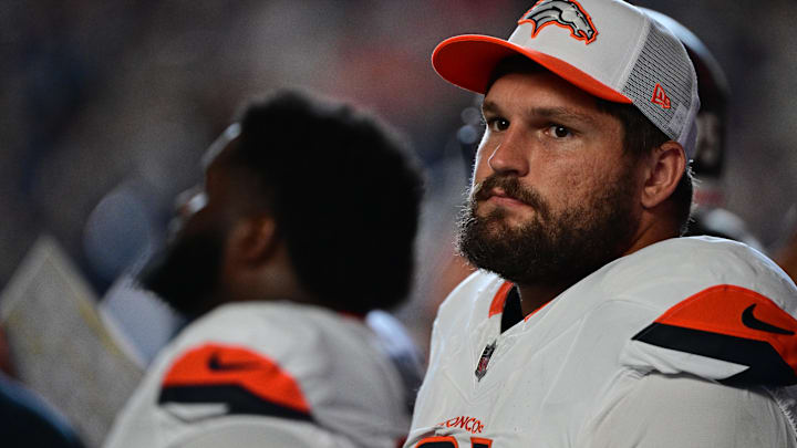 Aug 11, 2024; Indianapolis, Indiana, USA; Denver Broncos defensive end Matt Henningsen (91) stands near the bench before the game against the Indianapolis Colts at Lucas Oil Stadium. Mandatory Credit: Marc Lebryk-Imagn Images