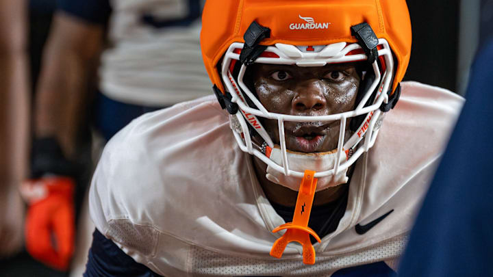 Illinois defensive end Tomiwa Durojaiye participates in drills during the Illini's spring practice in April. Illinois defensive end Tomiwa Durojaiye participates in drills during the Illini's spring practice in April.