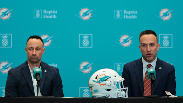 Miami Dolphins head coach Jeff Hafley, right, joined by general manager Jon-Eric Sullivan, left, speak to reporters during their introductory press conference at Baptist Health Training Complex. 