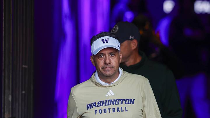 Aug 30, 2025; Seattle, Washington, USA; Washington Huskies head coach Jedd Fisch exits the locker room before pregame warmups against the Colorado State Rams at Husky Stadium. Mandatory Credit: Joe Nicholson-Imagn Images