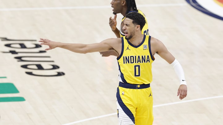 Jun 22, 2025; Oklahoma City, Oklahoma, USA; Indiana Pacers guard Tyrese Haliburton (0) reacts after a play against the Oklahoma City Thunder during the first half of game seven of the 2025 NBA Finals at Paycom Center. Mandatory Credit: Alonzo Adams-Imagn Images Jun 22, 2025; Oklahoma City, Oklahoma, USA; Indiana Pacers guard Tyrese Haliburton (0) reacts after a play against the Oklahoma City Thunder during the first half of game seven of the 2025 NBA Finals at Paycom Center. Mandatory Credit: Alonzo Adams-Imagn Images