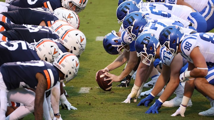 Sep 26, 2020; Charlottesville, Virginia, USA; The Duke Blue Devils offense lines up against the Virginia Cavaliers defense in the third quarter at Scott Stadium. Mandatory Credit: Geoff Burke-Imagn Images