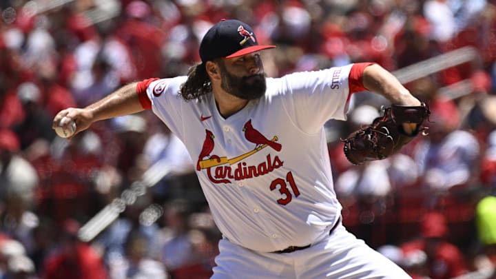 Jun 30, 2024; St. Louis, Missouri, USA; St. Louis Cardinals pitcher Lance Lynn (31) throws against the Cincinnati Reds during the first inning at Busch Stadium. 