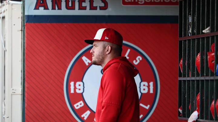 Aug 2, 2024; Anaheim, California, USA;  Los Angeles Angels outfielder Mike Trout (27) in the dugout during the MLB game against the New York Mets at Angel Stadium. 