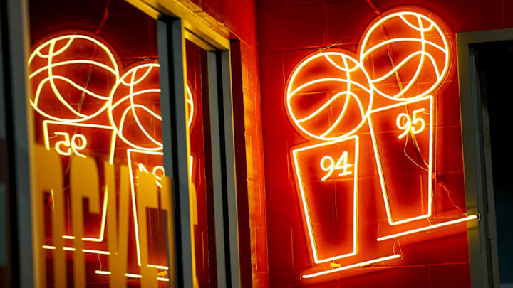 Mar 17, 2025; Houston, Texas, USA; View of neon signage in the hallway at Toyota Center commemorating the Houston Rockets championship seasons before the game against the Philadelphia 76ers. Mandatory Credit: Troy Taormina-Imagn Images