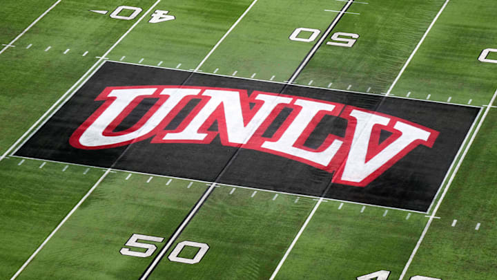 Dec 2, 2023; Las Vegas, NV, USA; The UNLV Rebels logo at midfield during the Mountain West Championship at Allegiant Stadium. Mandatory Credit: Kirby Lee-Imagn Images