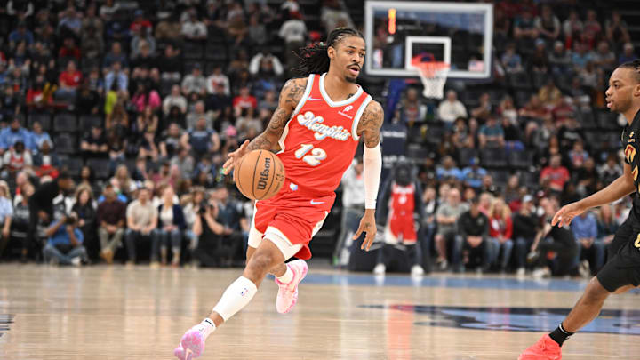 Mar 14, 2025; Memphis, Tennessee, USA; Memphis Grizzlies point guard Ja Morant (12) drives to the basket in the 1st quarter of the Cleveland Cavaliers vs. Memphis Grizzlies game at FedExForum. Mandatory Credit: Matthew Smith-Imagn Images