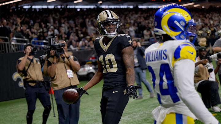 Dec 1, 2024; New Orleans, Louisiana, USA; New Orleans Saints wide receiver Marquez Valdes-Scantling (10) reacts after a touchdown against Los Angeles Rams cornerback Darious Williams (24) during the fourth quarter at Caesars Superdome. Mandatory Credit: Matthew Hinton-Imagn Images