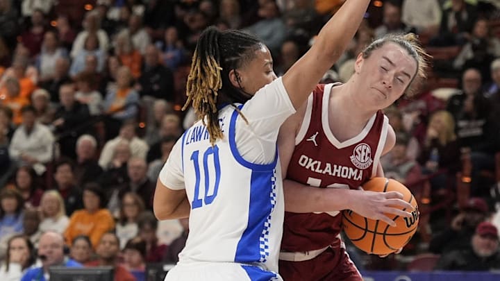 Oklahoma guard Payton Verhulst defended by Kentucky's Dazia Lawrence.