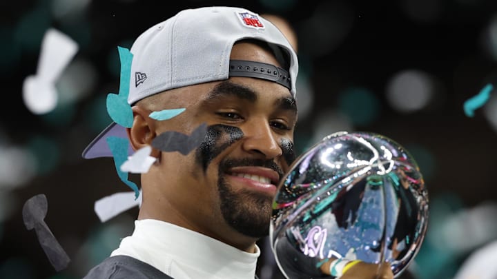 Feb 9, 2025; New Orleans, LA, USA; Philadelphia Eagles quarterback Jalen Hurts holds the Lombardi Trophy during the championship trophy presentation after the Eagles' game against the Kansas City Chiefs in Super Bowl LIX at Caesars Superdome. Mandatory Credit: Geoff Burke-Imagn Images Feb 9, 2025; New Orleans, LA, USA; Philadelphia Eagles quarterback Jalen Hurts holds the Lombardi Trophy during the championship trophy presentation after the Eagles' game against the Kansas City Chiefs in Super Bowl LIX at Caesars Superdome. Mandatory Credit: Geoff Burke-Imagn Images