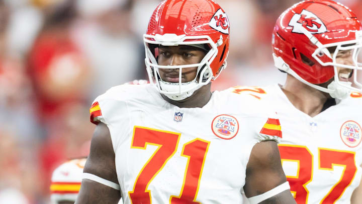 Aug 9, 2025; Glendale, Arizona, USA; Kansas City Chiefs offensive tackle Josh Simmons (71) against the Arizona Cardinals during a preseason NFL game at State Farm Stadium. Mandatory Credit: Mark J. Rebilas-Imagn Images