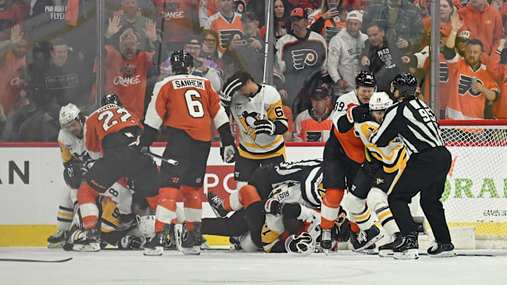 Apr 22, 2026; Philadelphia, Pennsylvania, USA; A melee breaks out during Philadelphia Flyers and Pittsburgh Penguins during the second period in game three of the first round of the 2026 Stanley Cup Playoffs at Xfinity Mobile Arena.