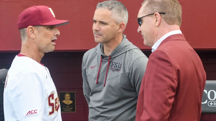 Florida State vice president and athletics director Michael Alford (right), football head coach Mike Norvell (middle) and baseball head coach Link Jarrett talk pregame during opening day against James Madison on Feb. 17, 2023, at Dick Howser Stadium.

Fsujmubaseball1 1 Of 1