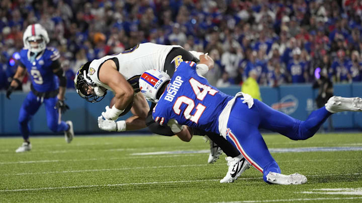 Sep 7, 2025; Orchard Park, New York, USA;  Buffalo Bills safety Cole Bishop (24) tackles Baltimore Ravens tight end Mark Andrews (89)