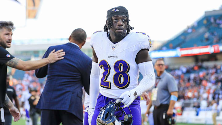 Baltimore Ravens safety Sanoussi Kane walks off the field after the victory over the Cincinnati Bengals.