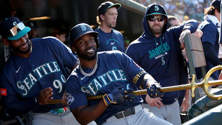 Sep 13, 2026; West Sacramento, California, USA; Seattle Mariners left fielder Randy Arozarena (56) celebrates with Lazaro Montes (99) in the dugout after hitting a solo home run against Athletics pitcher Hogan Harris (not pictured) during the eighth inning at Sutter Health Park. Mandatory Credit: Dennis Lee-Imagn Images Sep 13, 2026; West Sacramento, California, USA; Seattle Mariners left fielder Randy Arozarena (56) celebrates with Lazaro Montes (99) in the dugout after hitting a solo home run against Athletics pitcher Hogan Harris (not pictured) during the eighth inning at Sutter Health Park. Mandatory Credit: Dennis Lee-Imagn Images