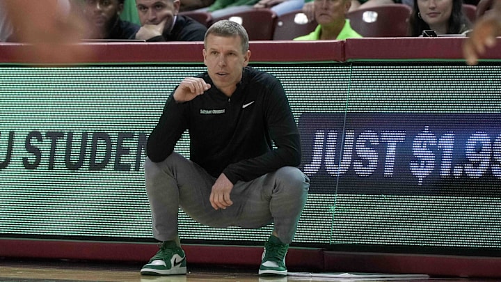 Nov 17, 2023; Charleston, SC, USA; North Texas Mean Green head coach Ross Hodge on the side line in the first half against the LSU Tigers at TD Arena. Mandatory Credit: David Yeazell-Imagn Images