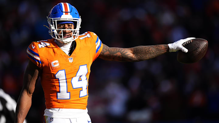 Jan 5, 2025; Denver, Colorado, USA; Denver Broncos wide receiver Courtland Sutton (14) following a first down reception in the first quarter against the Kansas City Chiefs at Empower Field at Mile High. 